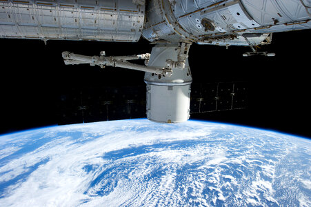 Spaceship above the earth photo