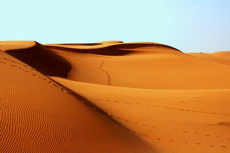 Footprints sand arid photo
