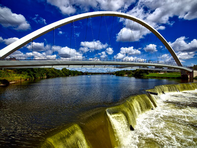 Bridge over the river and waterfall in Des Moines, Iowa photo
