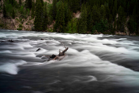 Whitewater flowing over rocks photo