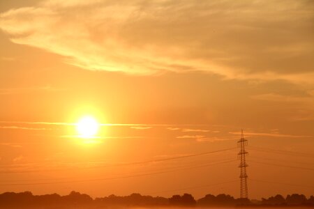 Sunset afterglow power poles photo