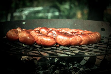 Sausages grill burning
