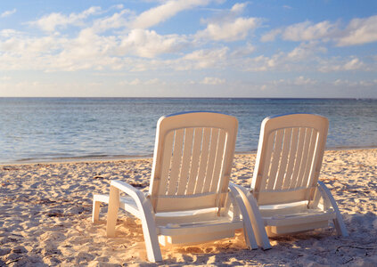 Two chairs on stunning tropical beach photo