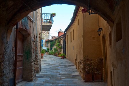 Sidewalk buildings arch