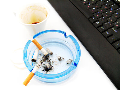 cigarette in ashtray photo