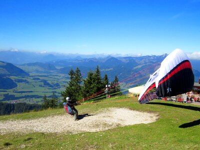 Paraglider mountains start