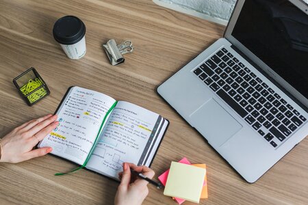 Writing In Notebook