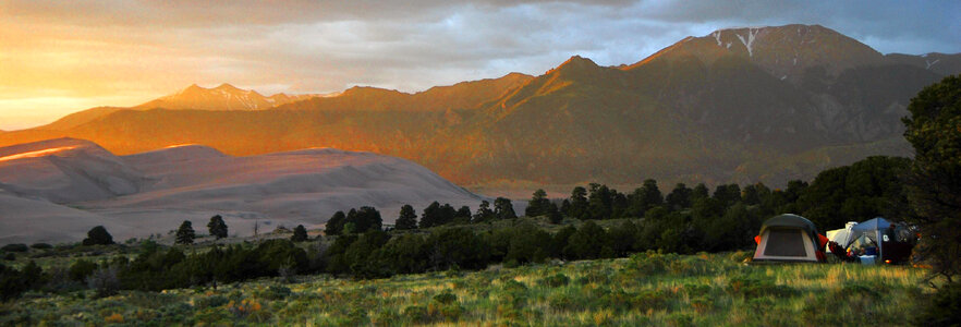 Sunrise over the hills in Great Sand Dunes National Park photo