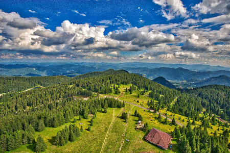 Scenic landscape with mountains under clouds and sky photo