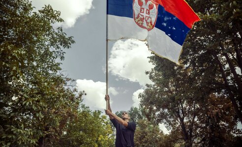 Flag standing Serbia photo