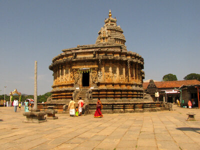 Old Temple in India with religious visitors photo