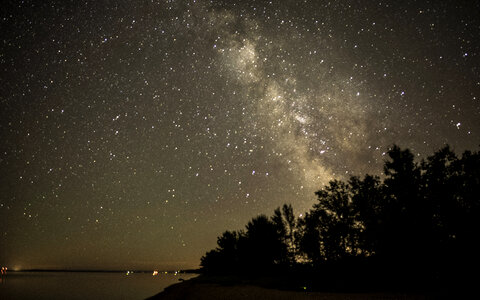 Milky Way Beyond the Trees in Bayfield, Wisconsin photo