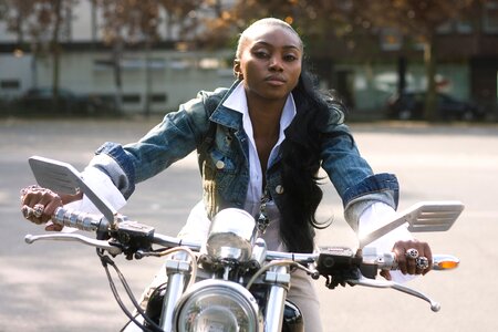 Woman riding motorcycle photo