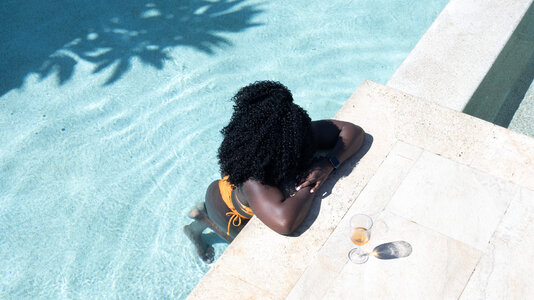 Woman poolside pool photo