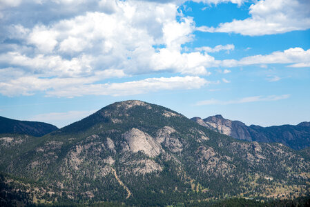 High Mountain with trees and clouds