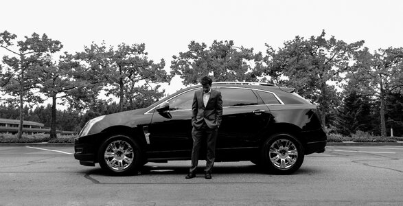 Business man in suit car