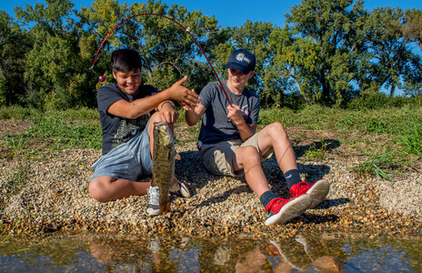 Two boys fishing for small mouth bass-1