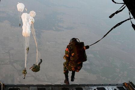 U.S. Air Force C-130H aircraft over a drop zone