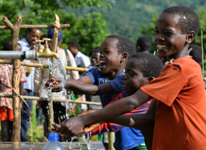 children enjoy water access for the first time photo