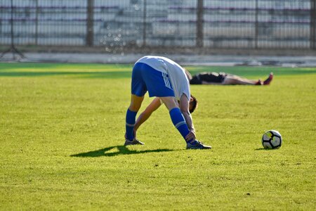 Football Player grass injury photo