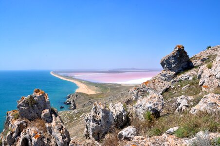 View from the mountains to the sea coast and mud pink lake photo