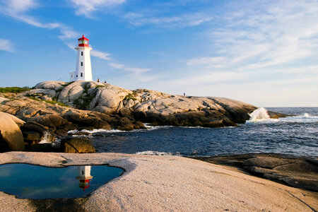 Lighthouse and Coastal Landscape in Nova Scotia photo