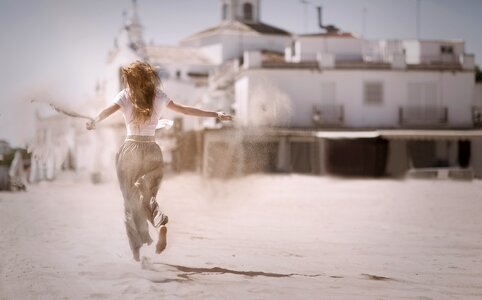 Woman Running Sand Beach photo