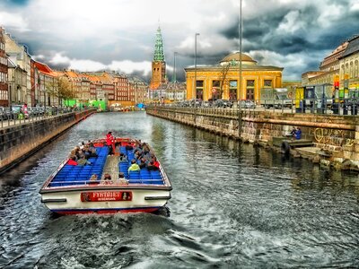 Boat going up the river in Copenhagen photo