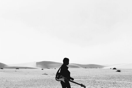 Walking alone musician