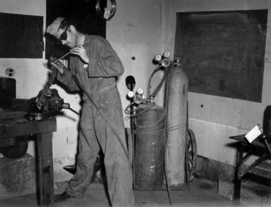Apparatus construction worker welding photo