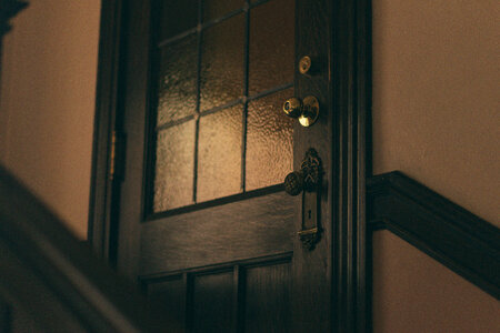 Closed Wooden Door In the Dark Corridor photo