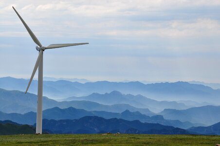 Early in the morning distant hills wind power wind energy photo