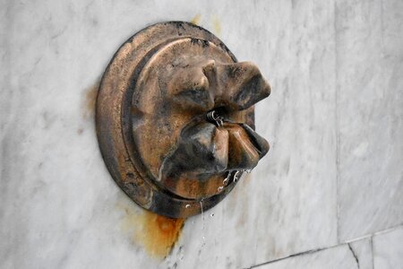 Bronze faucet fountain photo