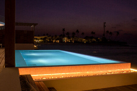 Swimming Pool with Lighting at Night photo