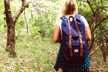 Backpack blonde hair forest photo
