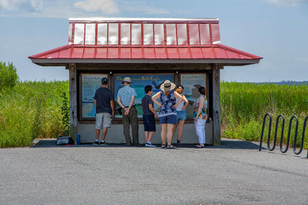 Group of people at kiosk