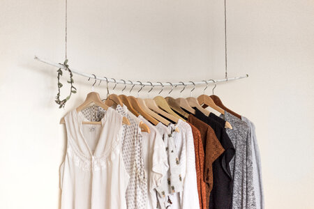 Variety of Casual Female Clothing on Hangers photo