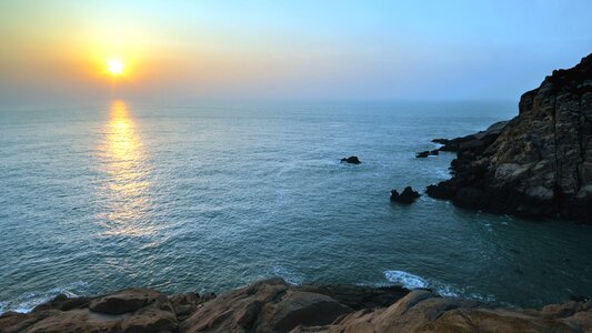 Cliff coastline dusk photo