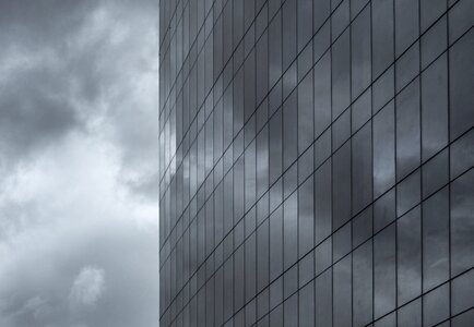 Clouds Reflecting on Skyscraper photo