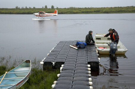 Employees at a boat dock