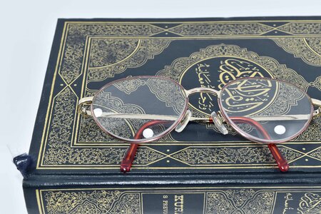 Book eyeglasses holly photo