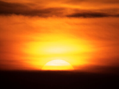 Sunset Big Yellow Sun on Orange Sky photo