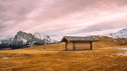 Small Wooden Hut in the Mountains photo
