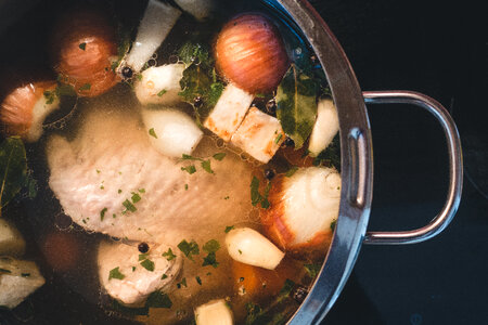 Cooking homemade chicken broth photo