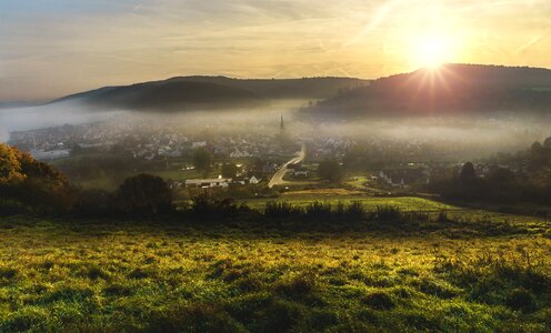 Sunlight over the landscape of Lugde, Germany photo