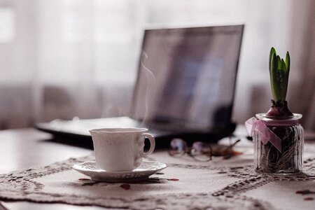 Steaming Coffee & Laptop photo