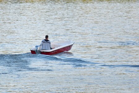 Man speedboat sea photo