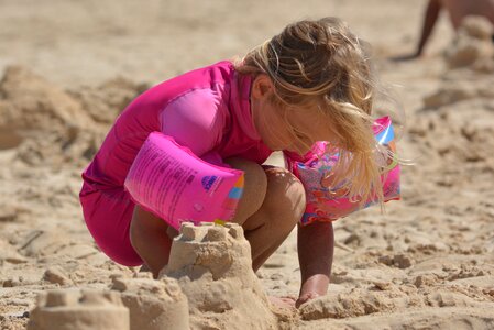 Girl pink sand