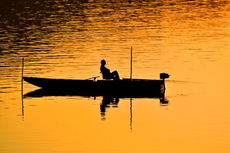 Boat calm fisherman