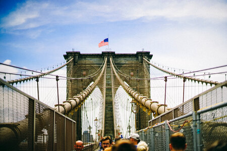 Walkway of Brooklyn Bridge with Pedestrians photo